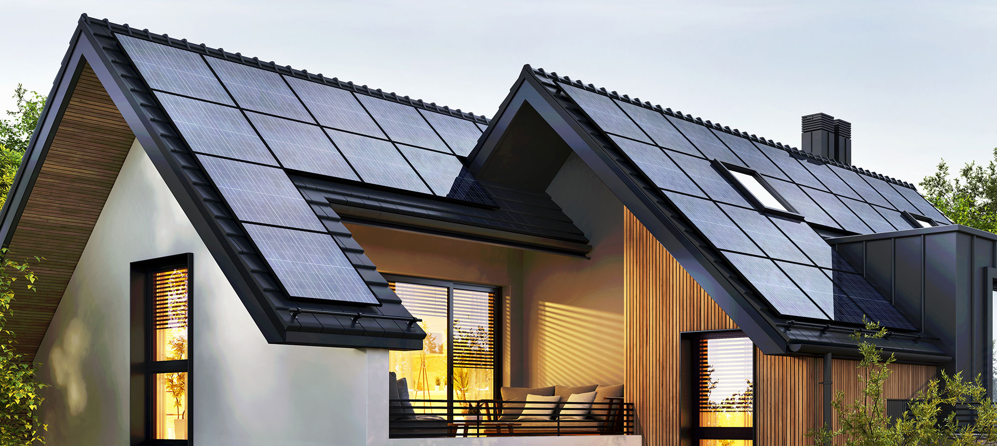 Aerial skyline view of Downtown Austin, Texas, showing the Colorado River, Ann W. Richards Congress Avenue Bridge, and modern high-rise condos in the 78701 area under a bright blue sky.